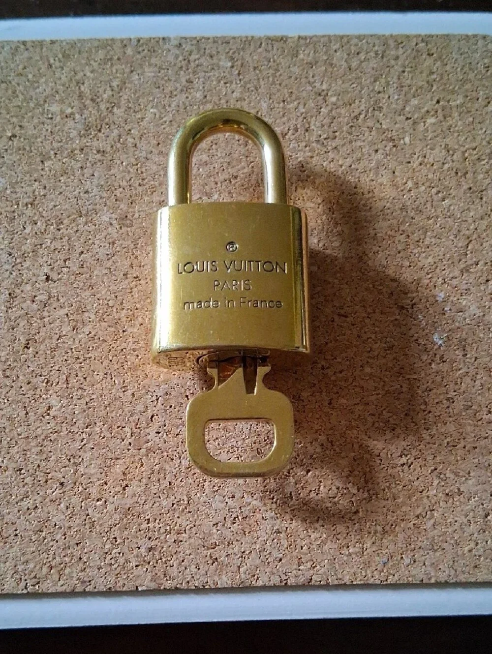 Louis Vuitton Gold Padlock and Key Set Shiny And NEW